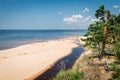 White dune in Saulkrasti city. River InÃÂupe flows through the beach.